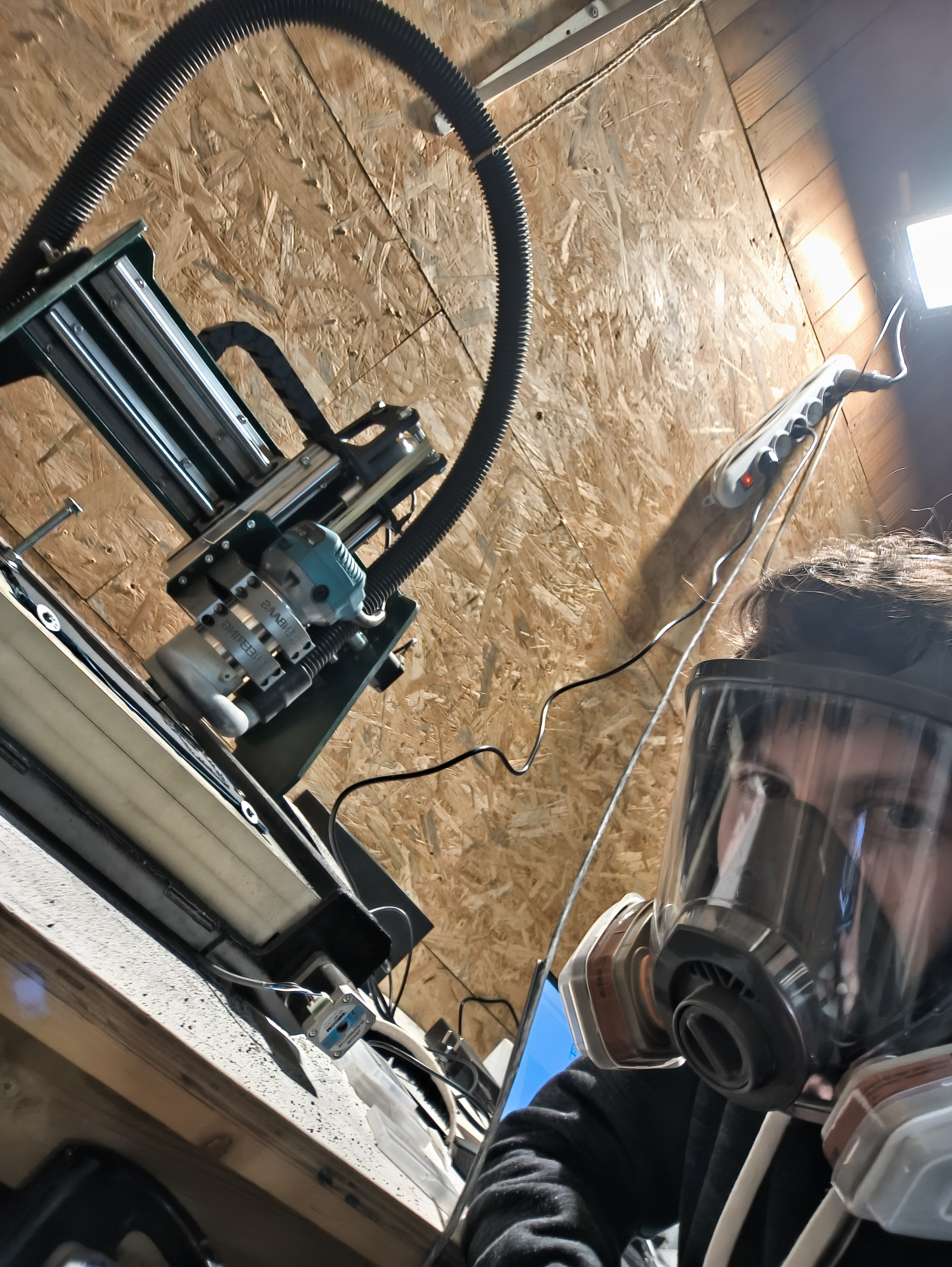 Me using the CNC on carbon fiber board